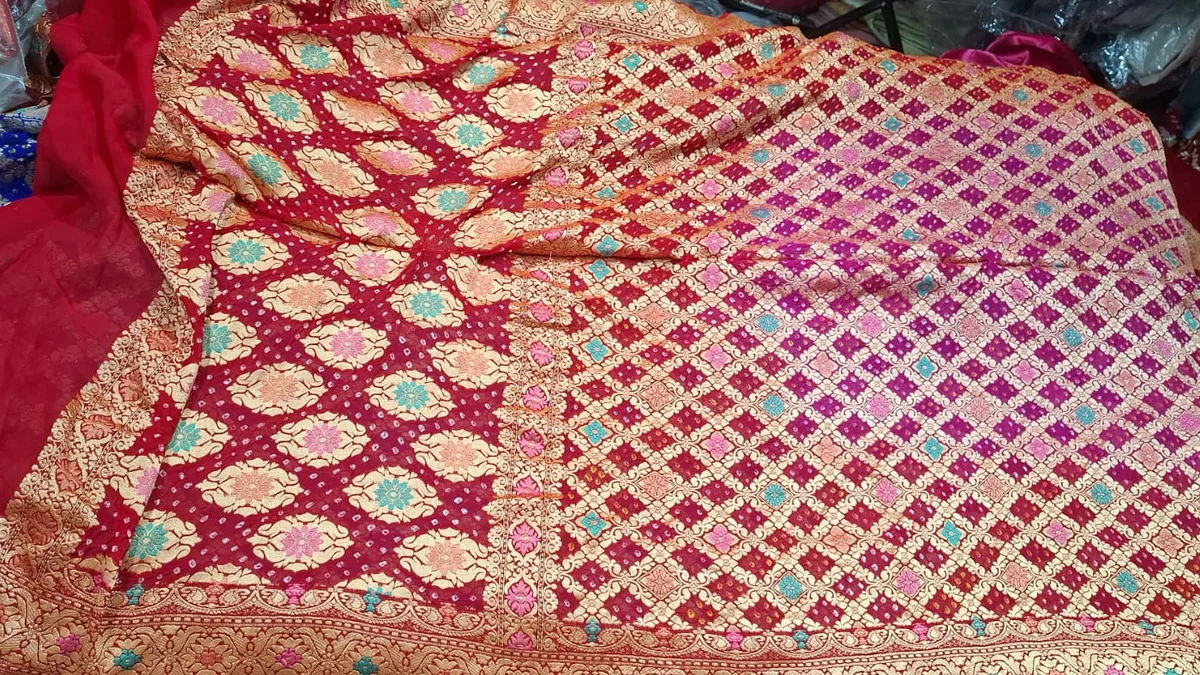 Crimson Rani saree laid flat